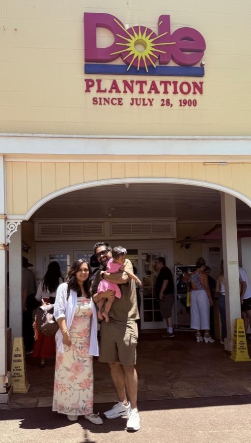 Gautam, Kanak, and Gia in front of the Dole Plantation entrance